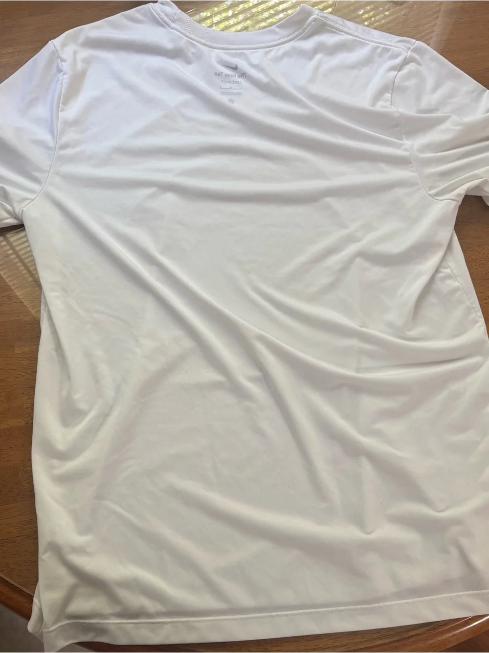 Nike White Short Sleeve Performance Tee with Black Swoosh